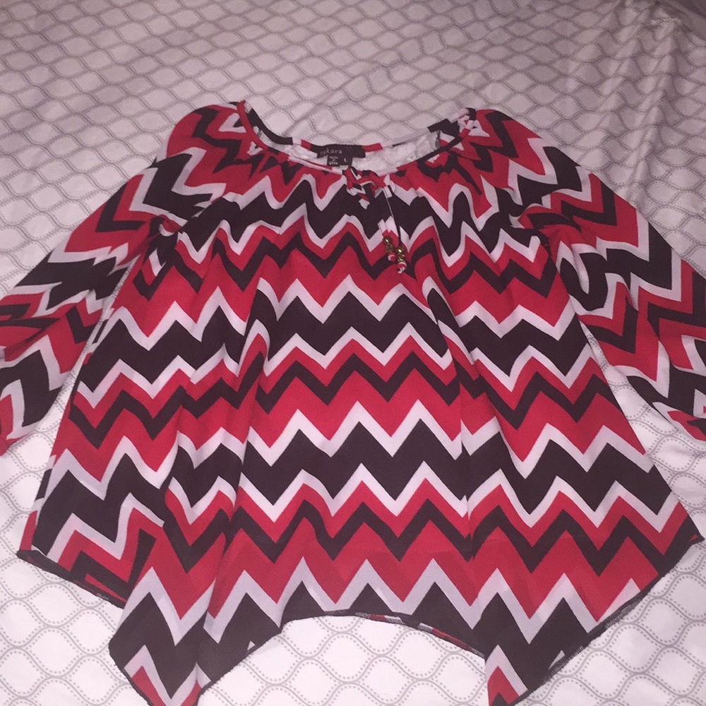 i am selling a brand new striped cute shirt